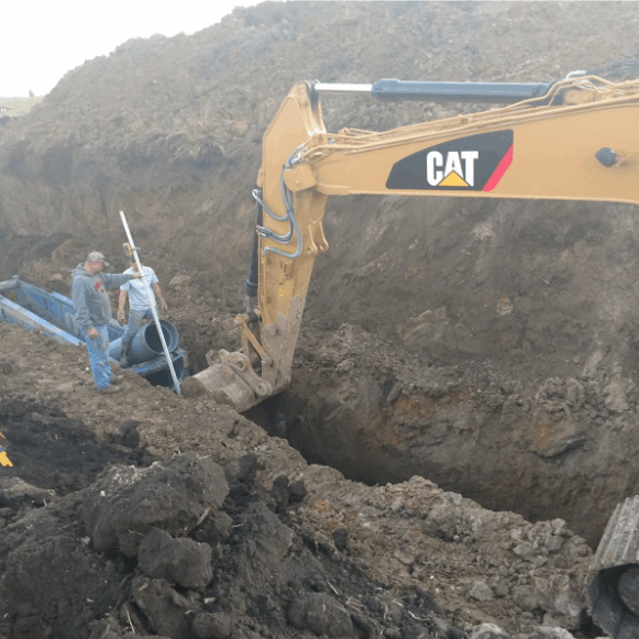 Because the existing line was buried at an extraordinary depth of 19 feet, the project required extensive excavation through heavy clay soils.